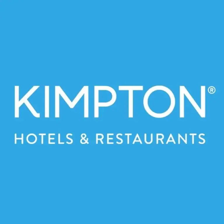 The image displays the logo of Kimpton Hotels & Restaurants, a hospitality business based in Roatan, Honduras.