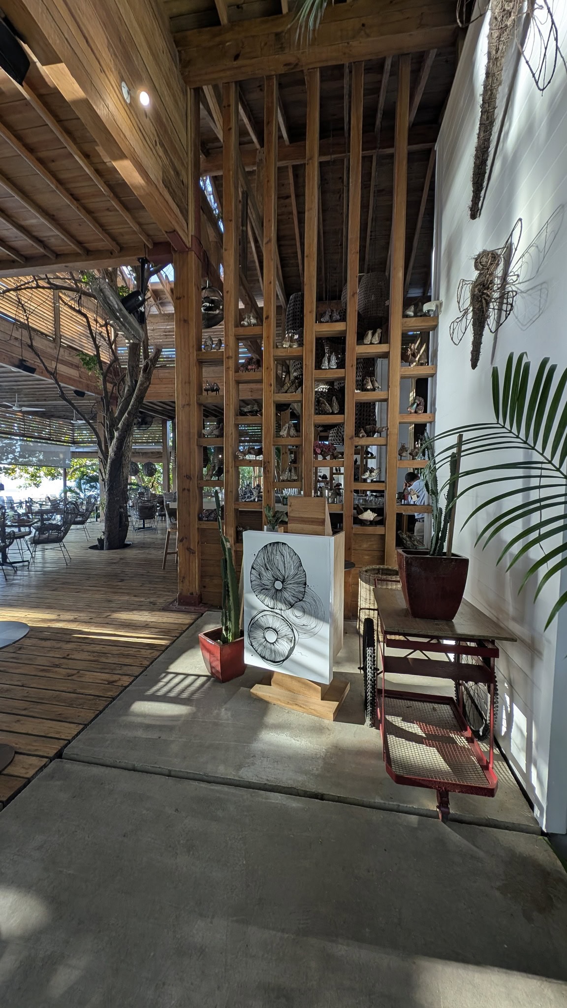 Elegant interior with wooden accents and artwork display.