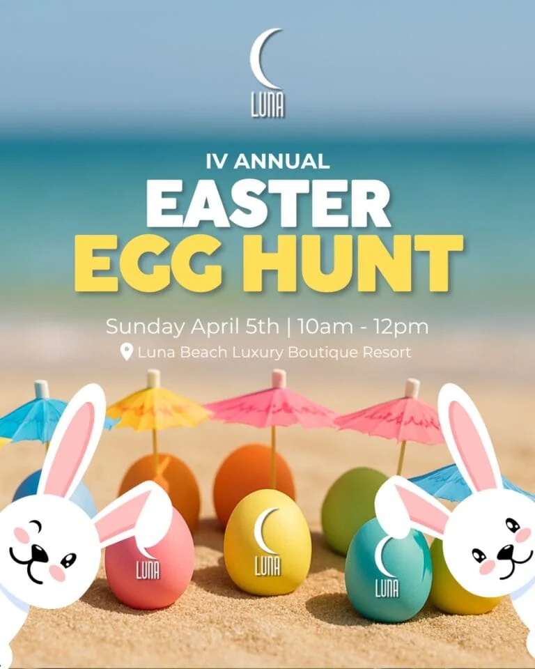 Colorful Easter eggs and bunny decorations at the beach.