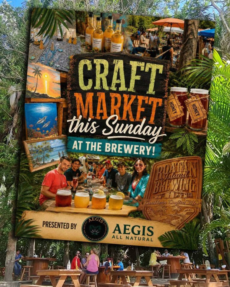 A lively outdoor craft market and brewery event in Roatan, Honduras, featuring artisanal jewelry, craft beverages, and groups of people enjoying drinks at a long wooden table amid lush tropical trees.
