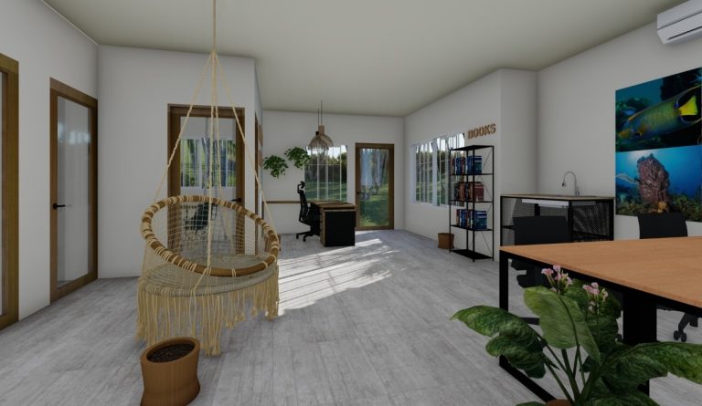 A bright, modern office space in Roatan, Honduras, features large windows, a desk with a black chair overlooking a green outdoor view, a bookshelf labeled "BOOKS," a colorful underwater-themed wall art, a cozy hanging wicker chair with a small plant nearby, and a wooden table with black chairs and indoor plants.