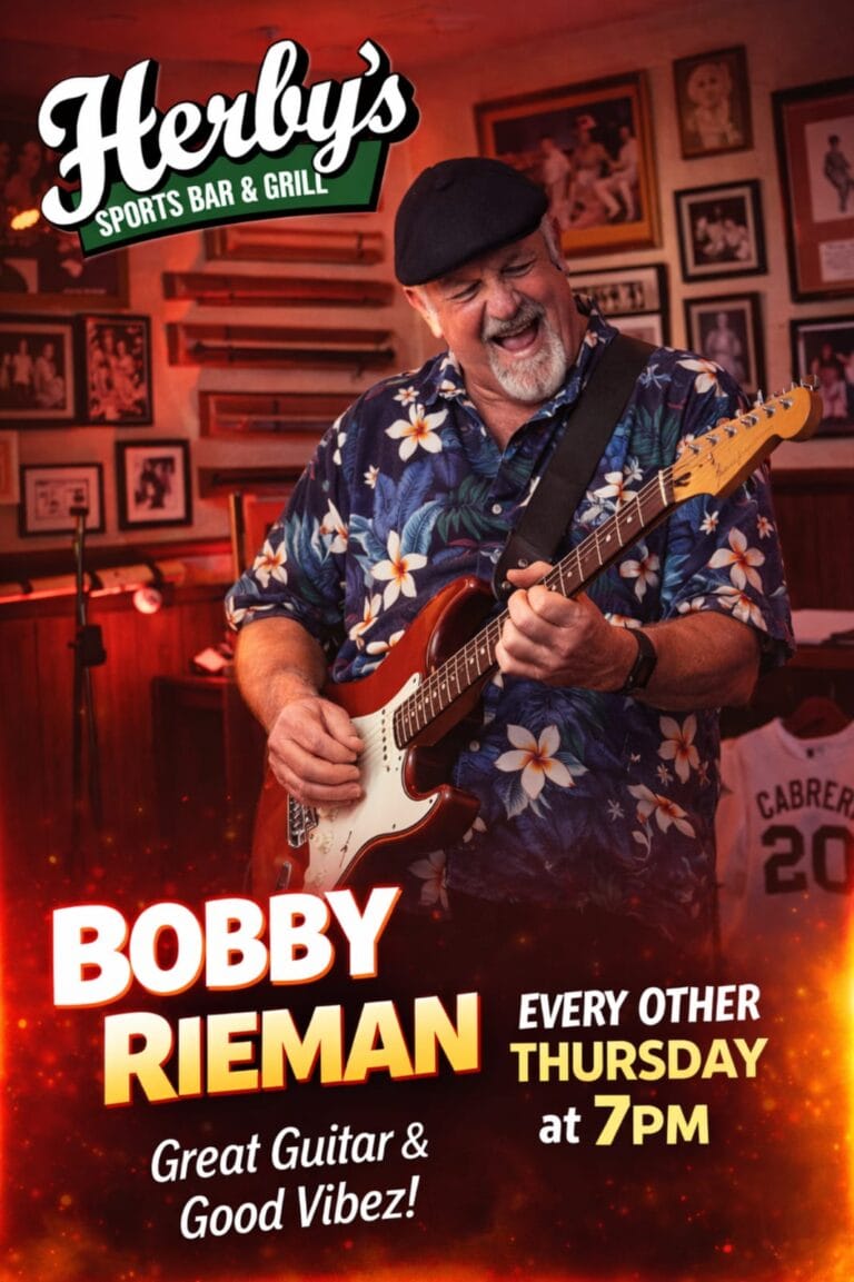 A cheerful older man wearing a floral Hawaiian shirt and black beret plays an electric guitar inside Herby's Sports Bar & Grill in Roatan, Honduras, with framed photos and memorabilia lining the wood-paneled walls in the background.