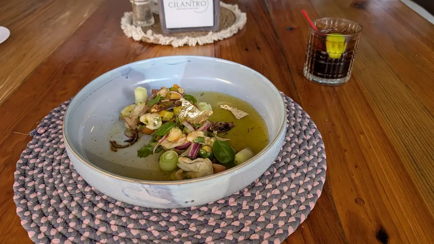 Peruvian-style ceviche at Green Cilantro with mango and fresh herbs