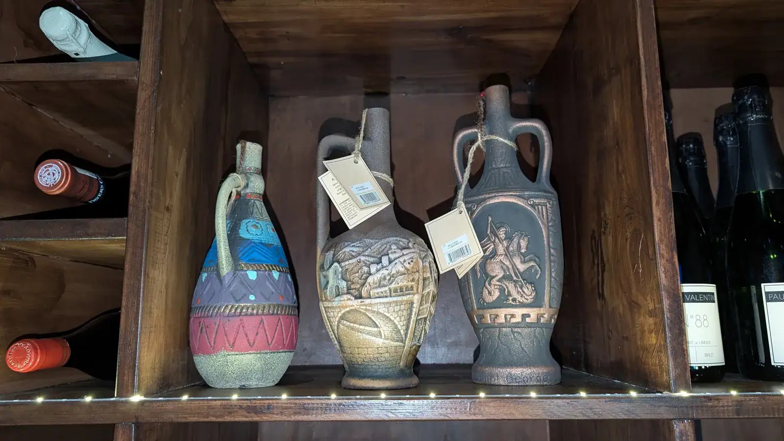 Georgian wines in traditional clay amphora bottles on display at Wine Not