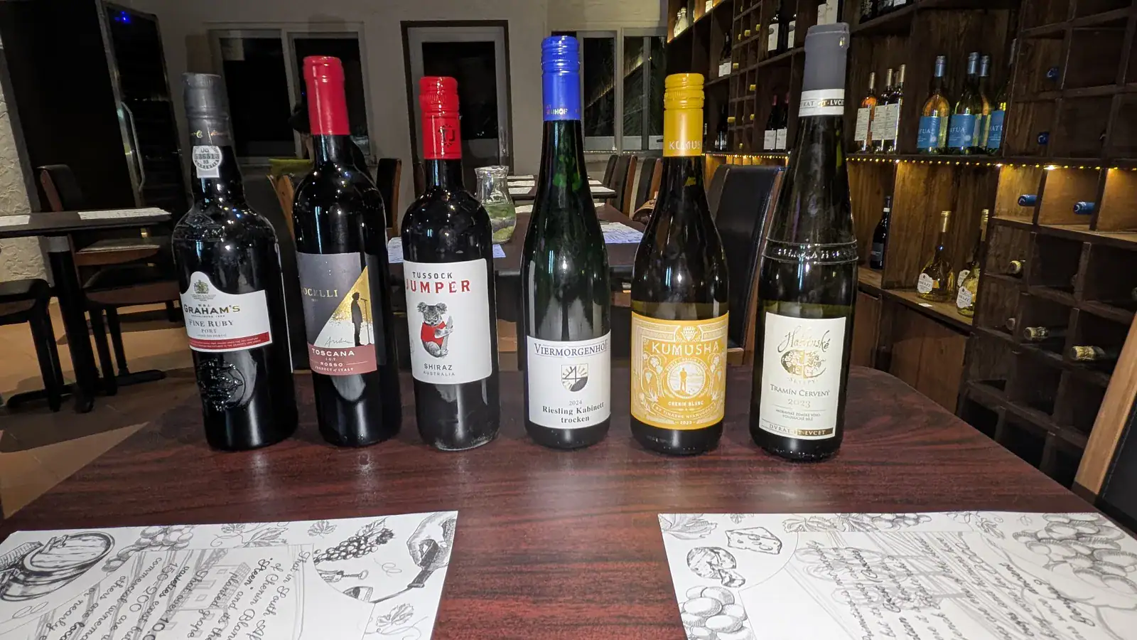 All six wines from the Around the World tasting at Wine Not lined up on table