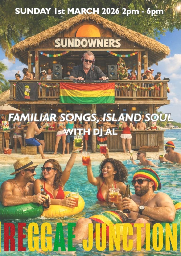 A lively outdoor event at a beachfront tiki hut in Roatan, Honduras, featuring a DJ performing on a deck decorated with colorful flags and a crowd of people in swimwear enjoying drinks and dancing in the pool under sunny skies.