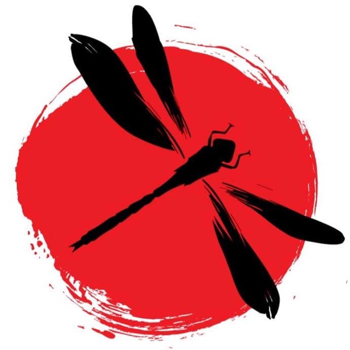 A black silhouette of a dragonfly is shown against a red circular background with a textured, brushstroke appearance, representing Roatan in Honduras.