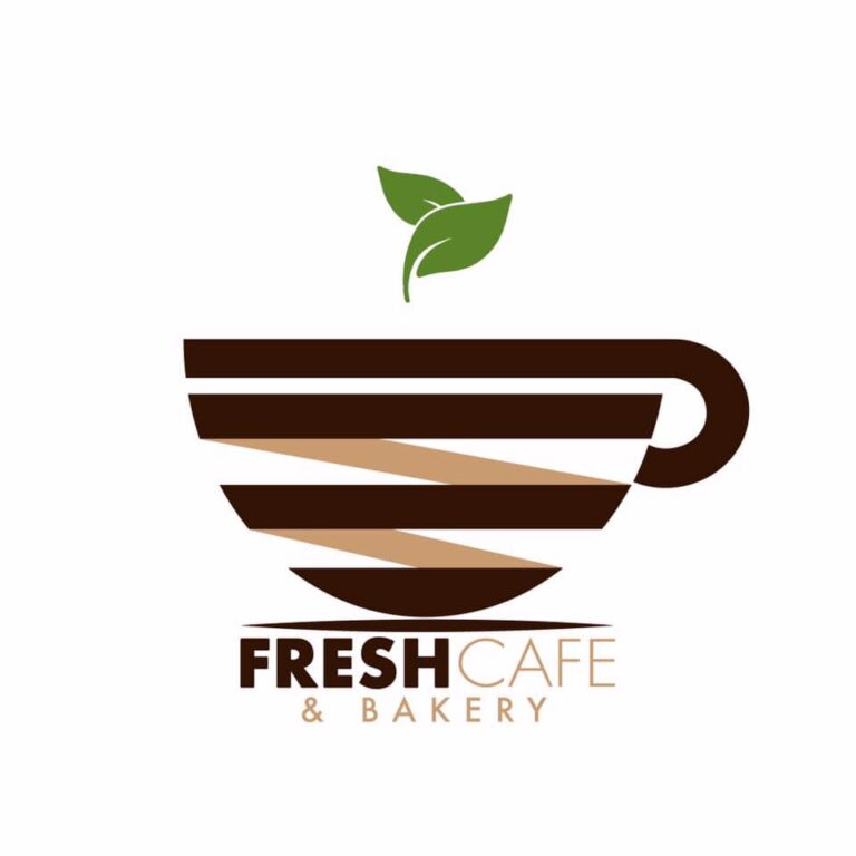 The logo for Roatan Fresh Café & Bakery in Honduras features a coffee cup with brown and beige stripes, topped with two green leaves, symbolizing coffee and freshness.