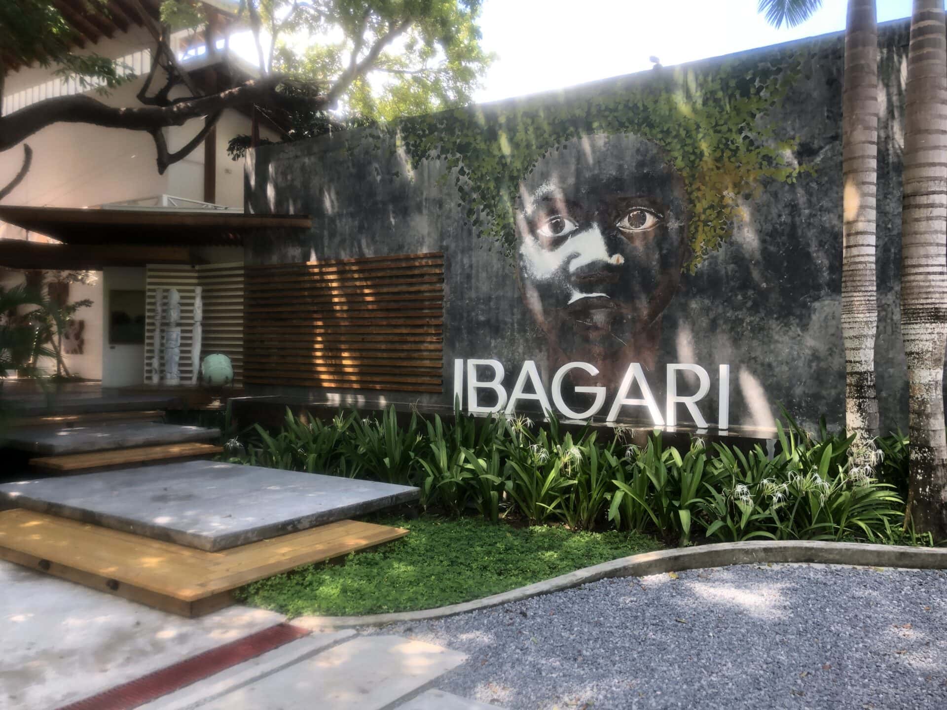 Vibrant mural of a child's face at Luna Muna by Ibagari restaurant in Roatan.