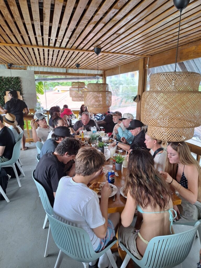 Group dining experience at Jonathan Brown Roatan Tours.