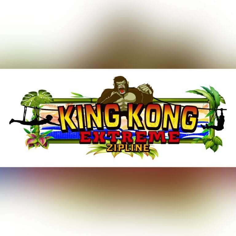 The image features a colorful logo for King Kong Extreme Zipline in Roatan, Honduras, with a fierce gorilla illustration, jungle foliage, and silhouettes of people ziplining against a tropical backdrop.