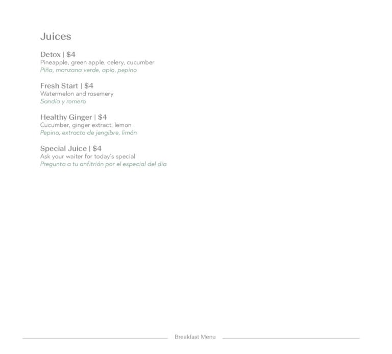 A close-up of a printed juice menu from a restaurant in Roatan, Bay Islands, Honduras, showing various fresh juice options with their prices and ingredients.