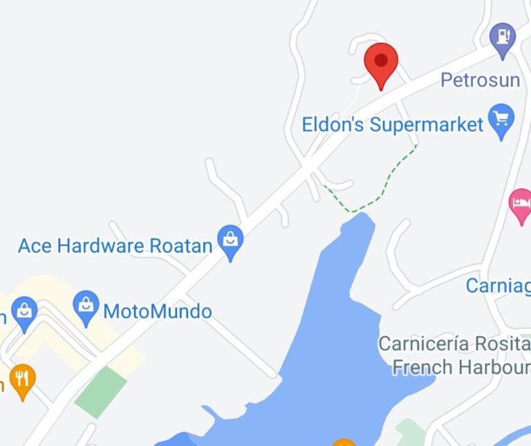 A map showing the location of a business on Roatan, Honduras, near Eldon's Supermarket, Ace Hardware Roatan, and MotoMundo, with nearby landmarks including a lake and various stores.