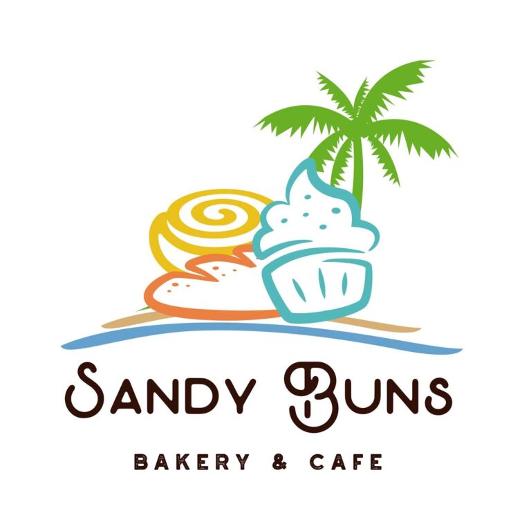 The image shows a colorful logo for Sandy Buns Bakery & Café with a green palm tree, a cupcake, and a swirl of yellow frosting on a sandy beach, representing a relaxing tropical setting in Roatan, Honduras.