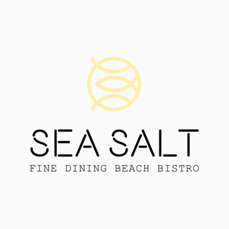 The image displays the logo for Sea Salt, a fine dining beach bistro in Roatan, Honduras, featuring a stylized yellow fish and the text "Sea Salt Fine Dining Beach Bistro.