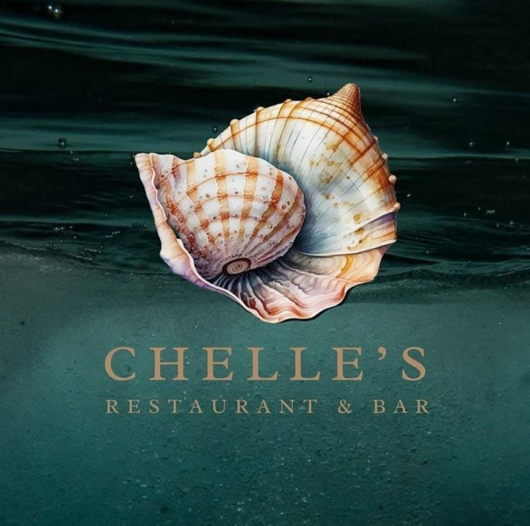 An underwater scene features a large seashell floating on the ocean surface with the text "Chelle's Restaurant & Bar" below, representing a business in Roatan, Honduras.