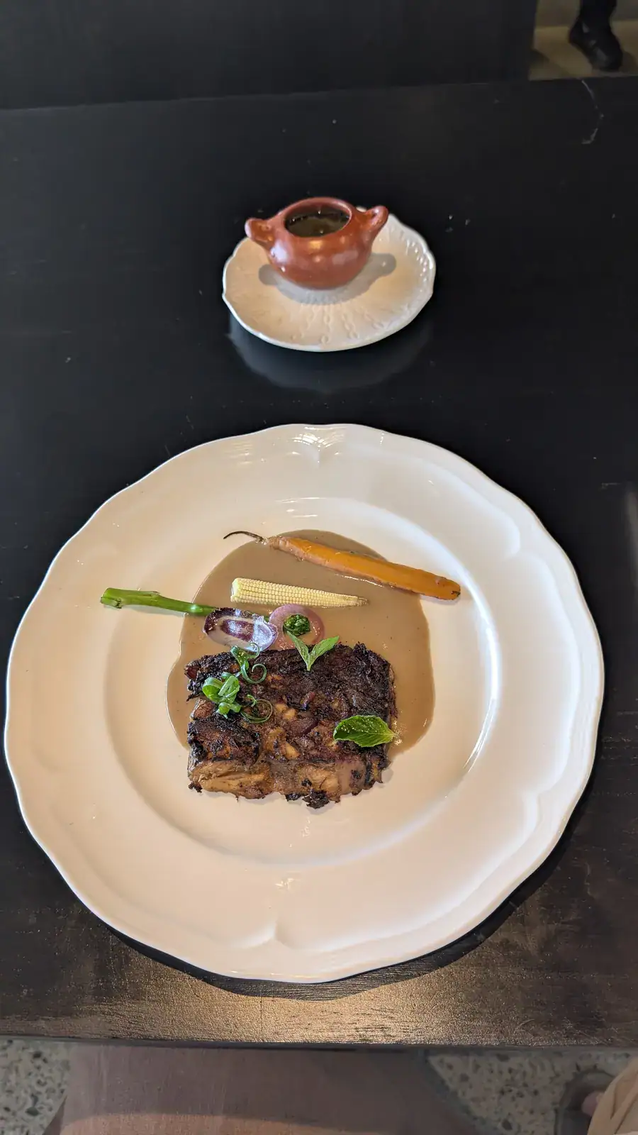Gallina India course at Spirit Origin Coffee Omakase — hen terrine with crispy skin, demi-glace, baby corn, and heirloom potato