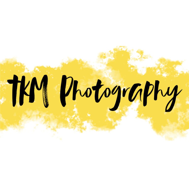 Logo of TKM Photography with yellow splash background.